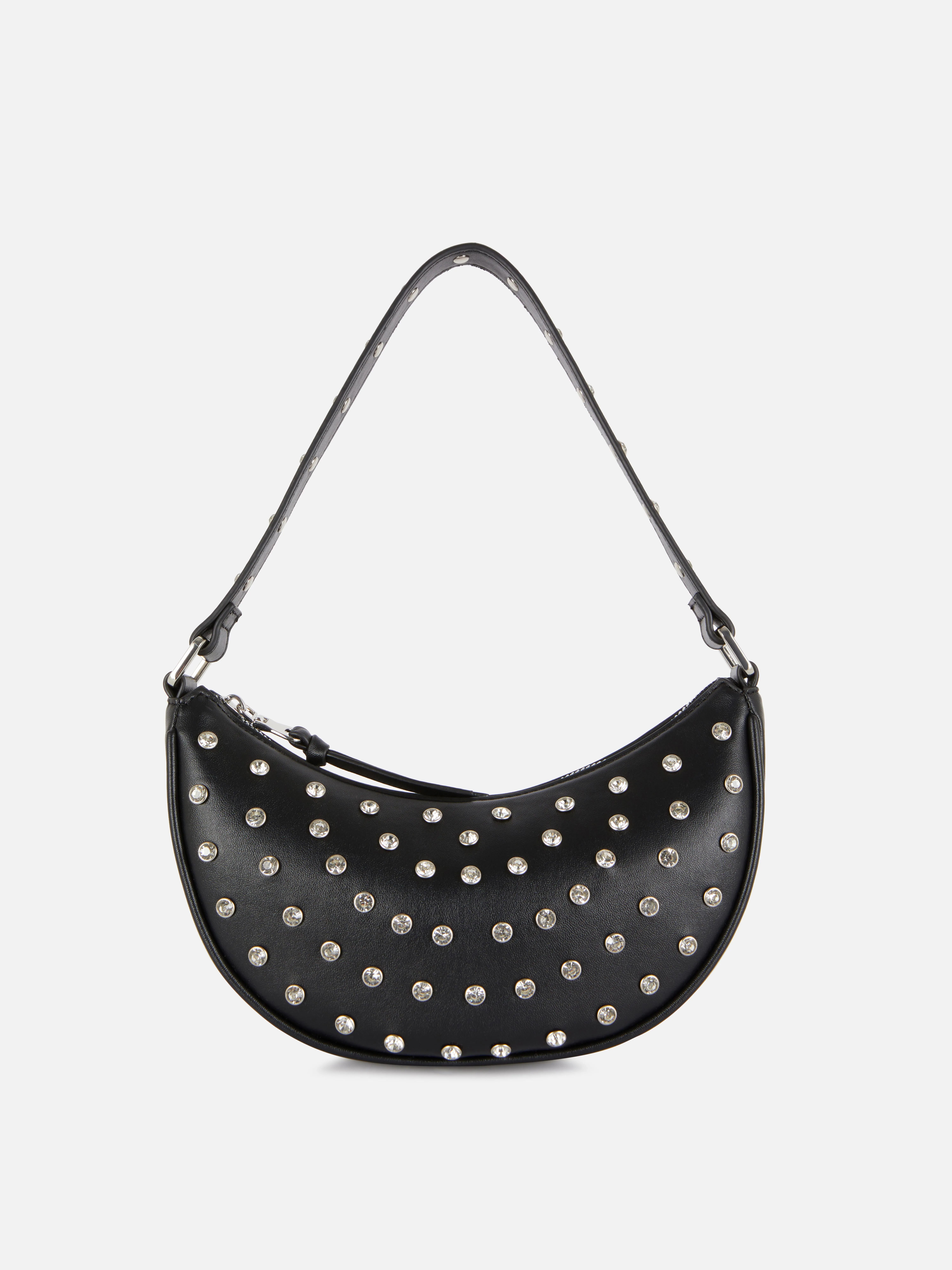 Bolso de mano con strass y tachuelas de Rita Ora
