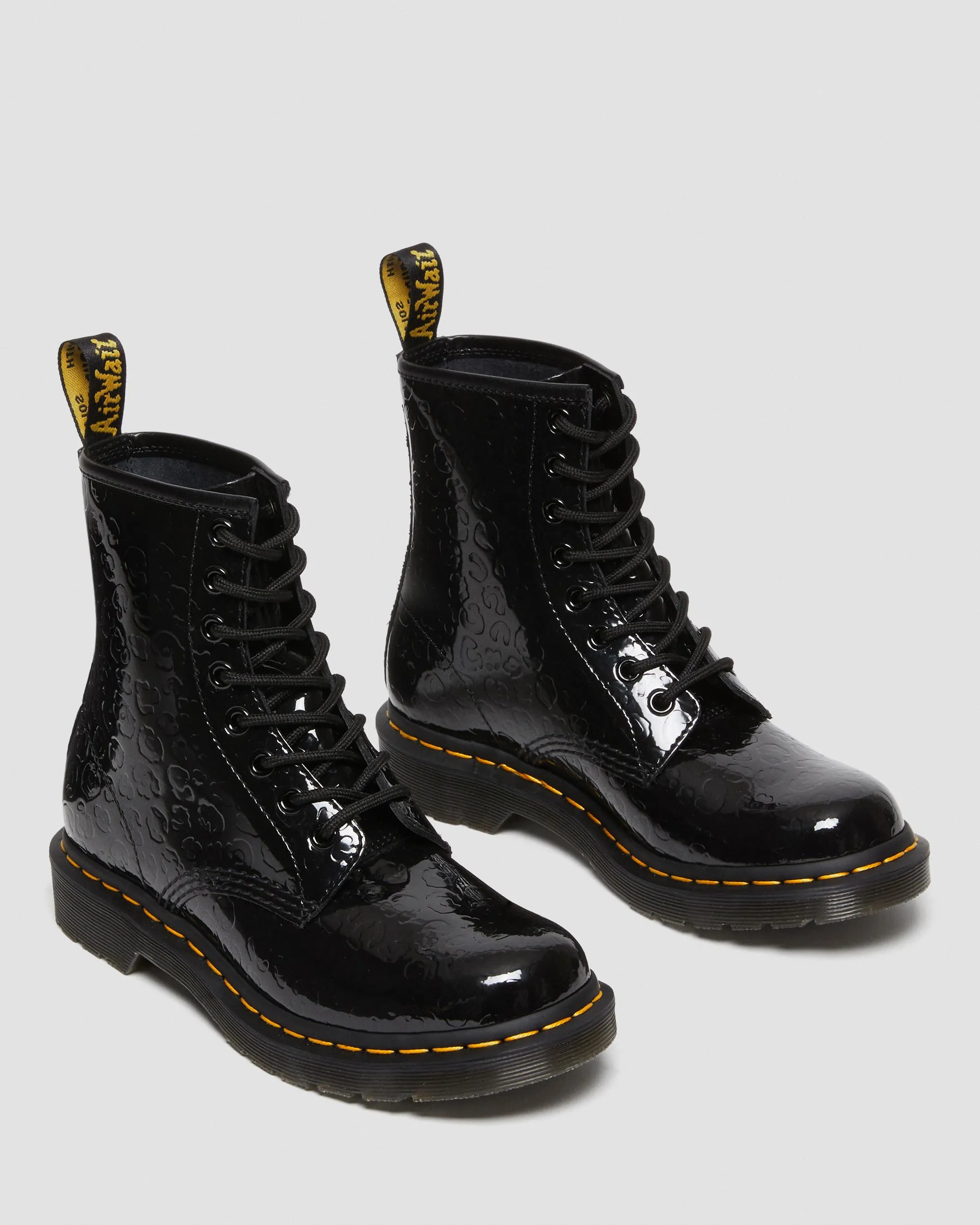 Botas 1460 en charol con efecto leopardo