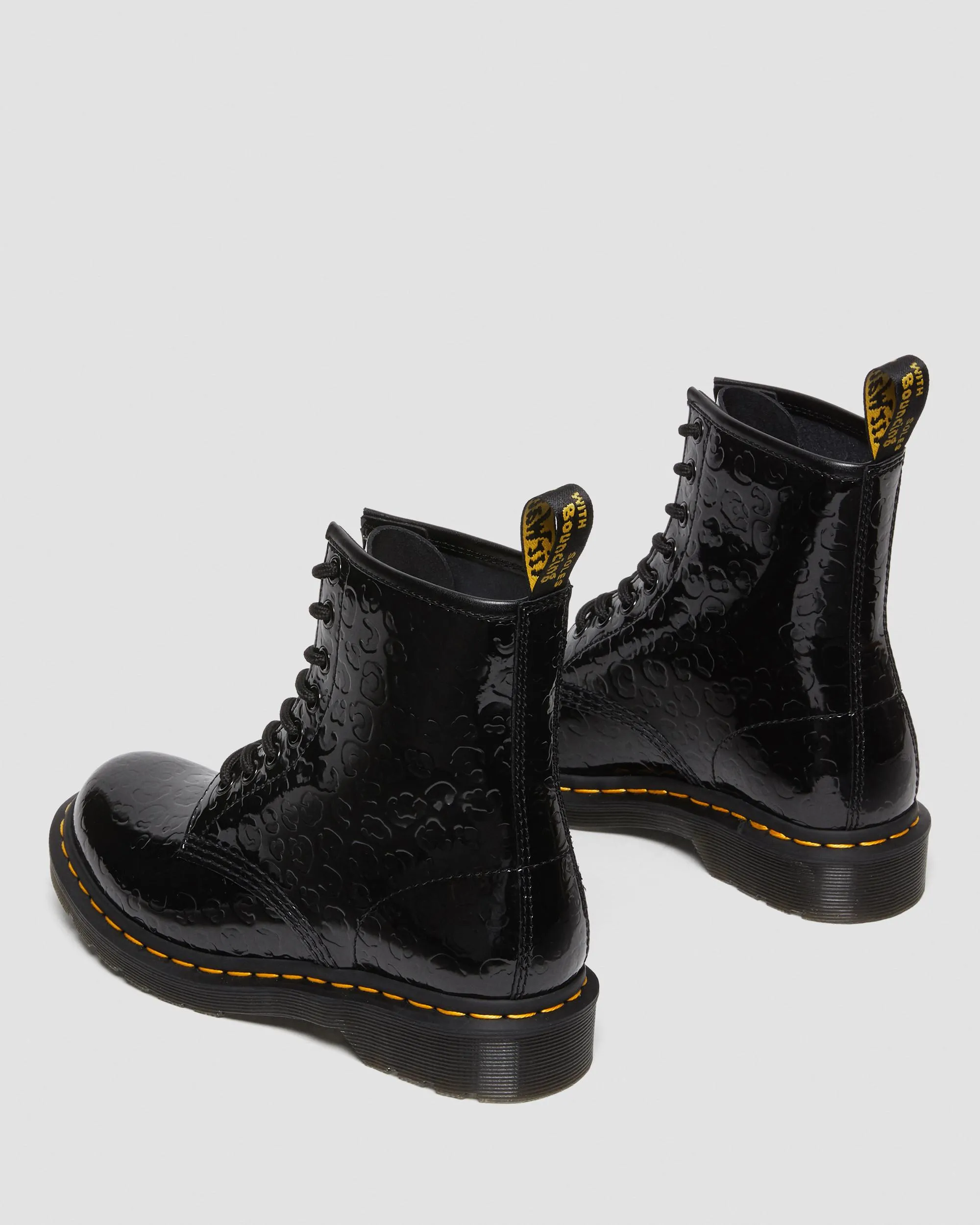 Botas 1460 en charol con efecto leopardo