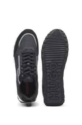 Deportivas de diferentes materiales con cordones y monogramas en el empeine