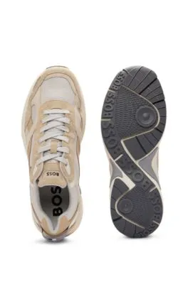 Deportivas de estilo runner con mezcla de pieles y ribetes de malla