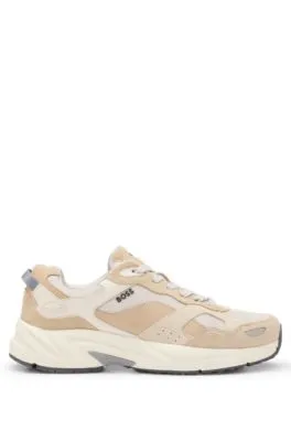 Deportivas de estilo runner con mezcla de pieles y ribetes de malla