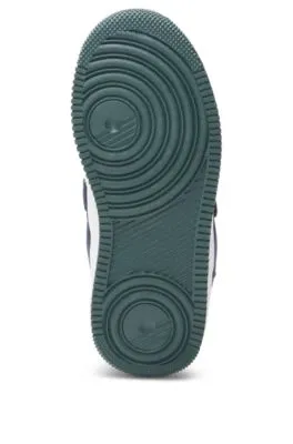 Deportivas para niños en mezcla de materiales con lengüeta de malla