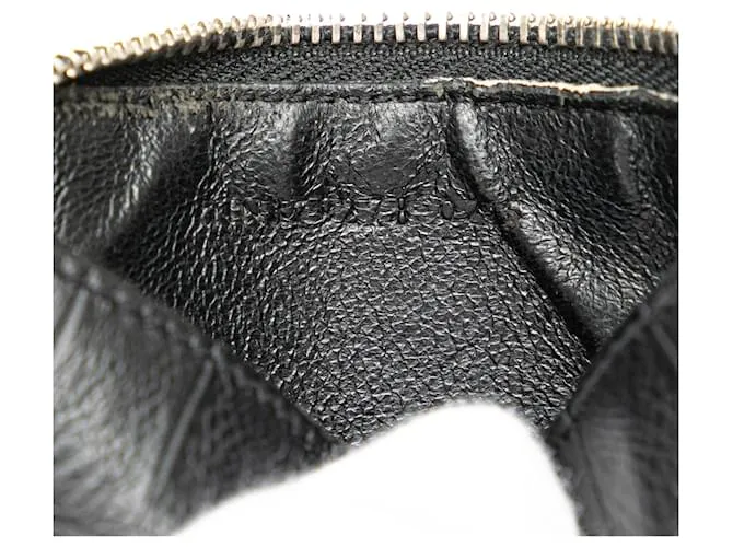 Monedero de cuero negro grabado Saint Laurent 
