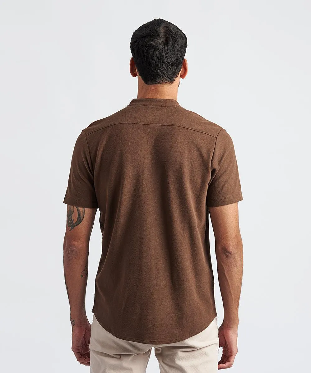 POLO MANGA CORTA CAMISERO CON CORTE DE RAYAS MARRON PV24