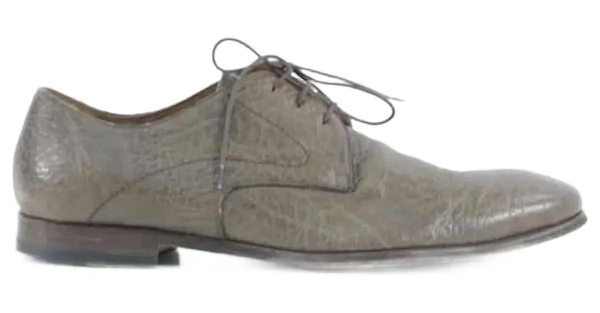 Saint Laurent Derbies de cuero Castaño 