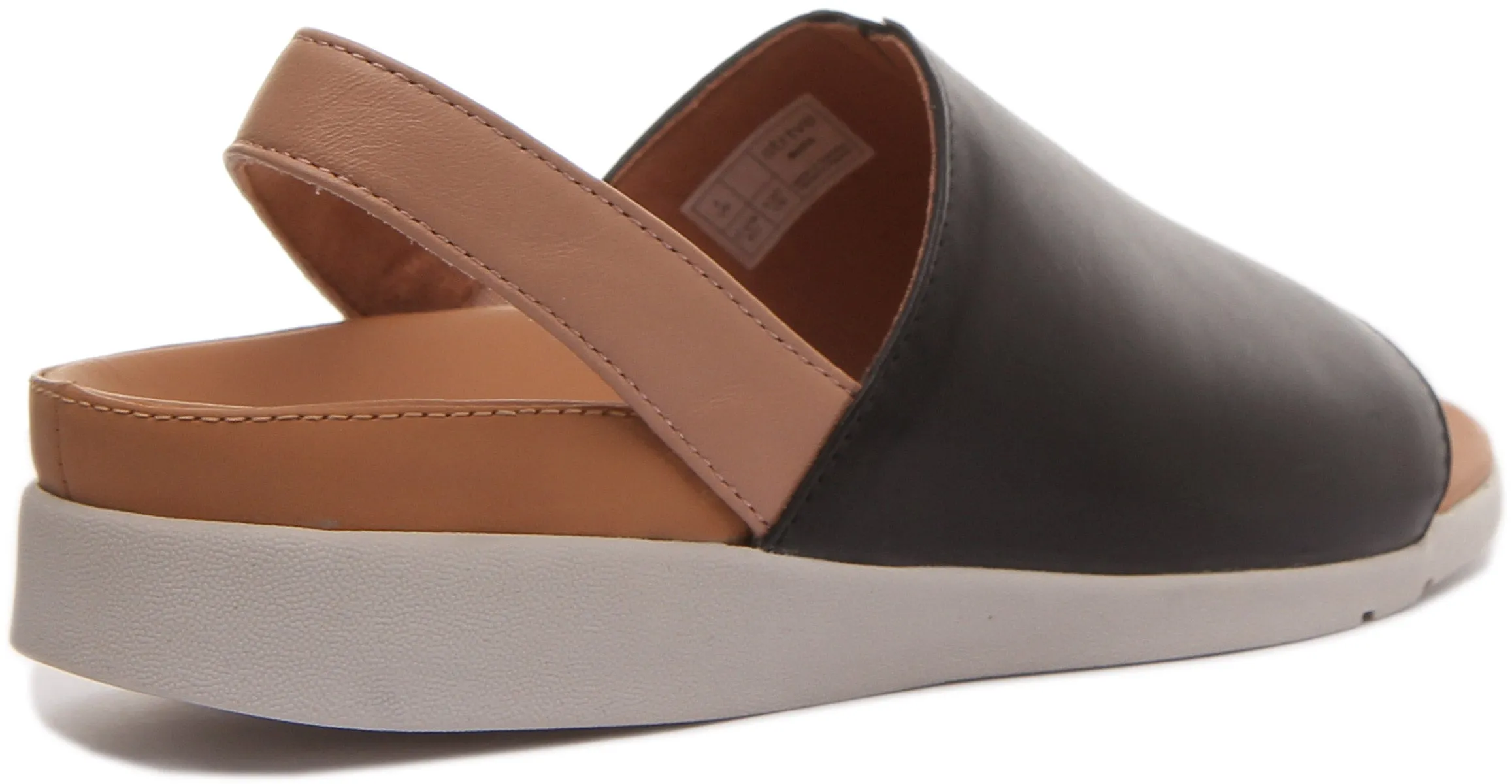 Strive Mara Sandalia con tira de cuero elevada para mujer en leopardo