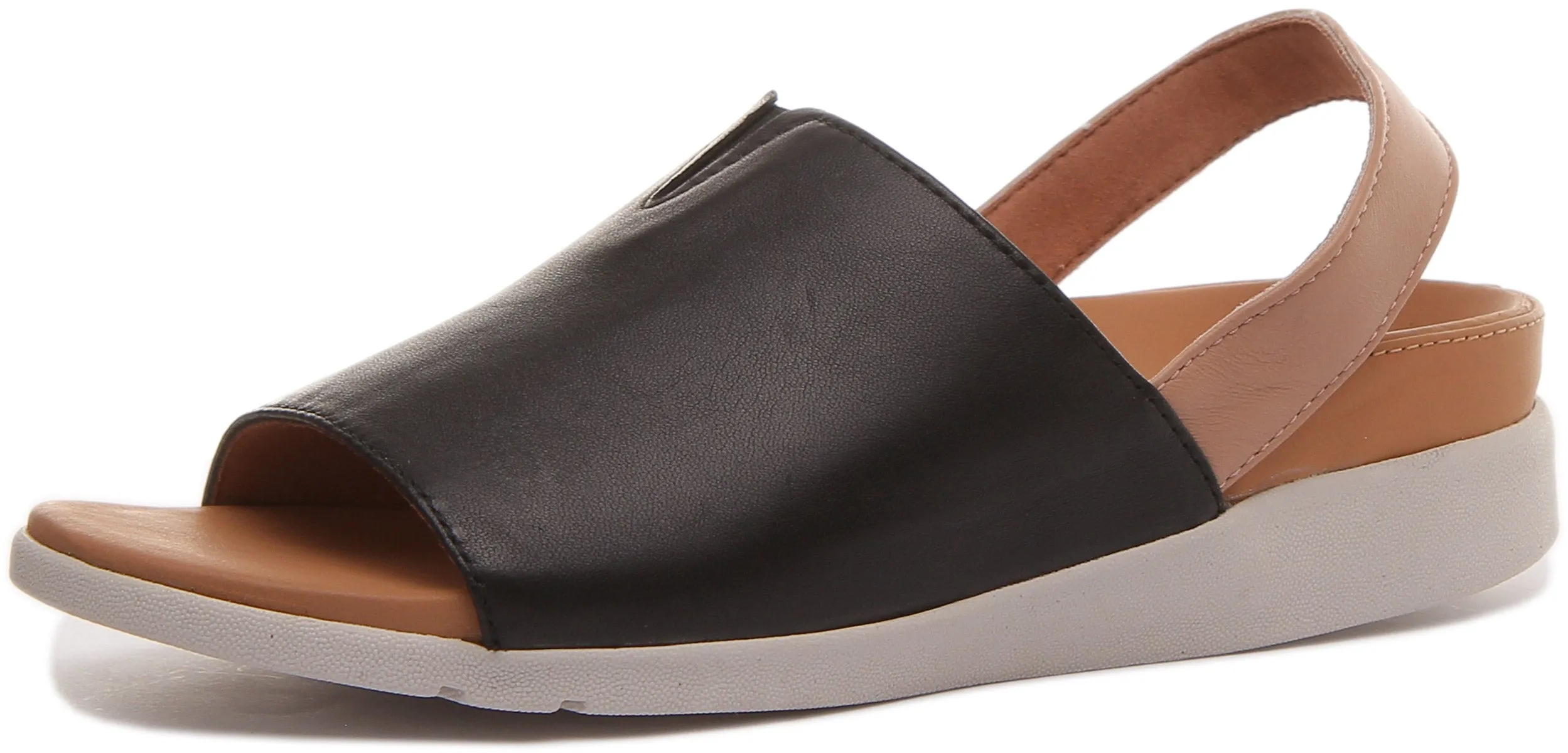 Strive Mara Sandalia con tira de cuero elevada para mujer en leopardo