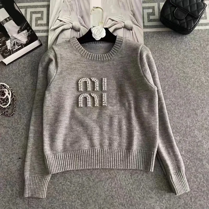 Sweaters de jersey de diseñador Mujeres Sweater Knit Sweter Fashion Mujer Femenina Outumn Winter Clothing Ladies White Flow Long