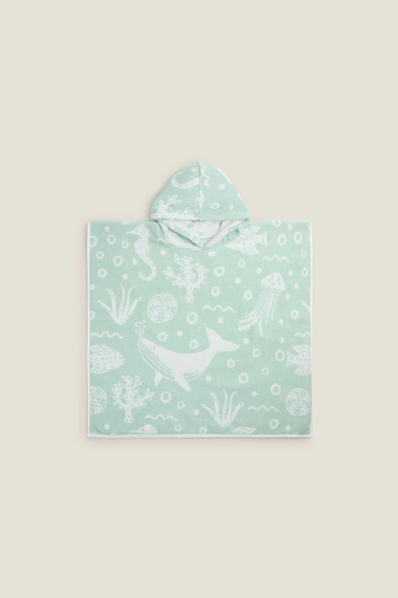 Toalla poncho mundo marino