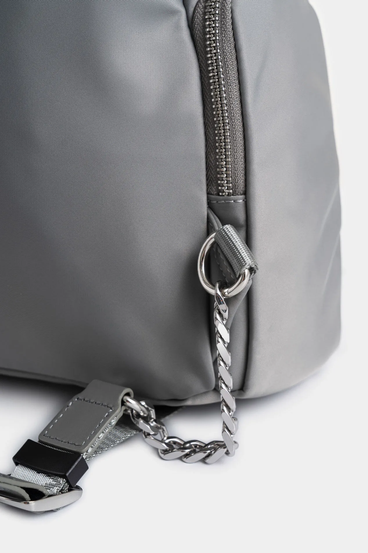 Tula morral Orión de lona y cuero para mujer detalle trenzado