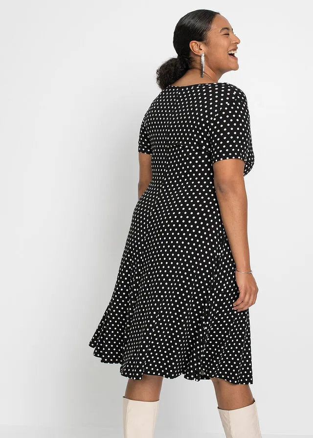 VESTIDO DE PUNTO DE VISCOSA SOSTENIBLE NEGROBLANCO DE LUNARES